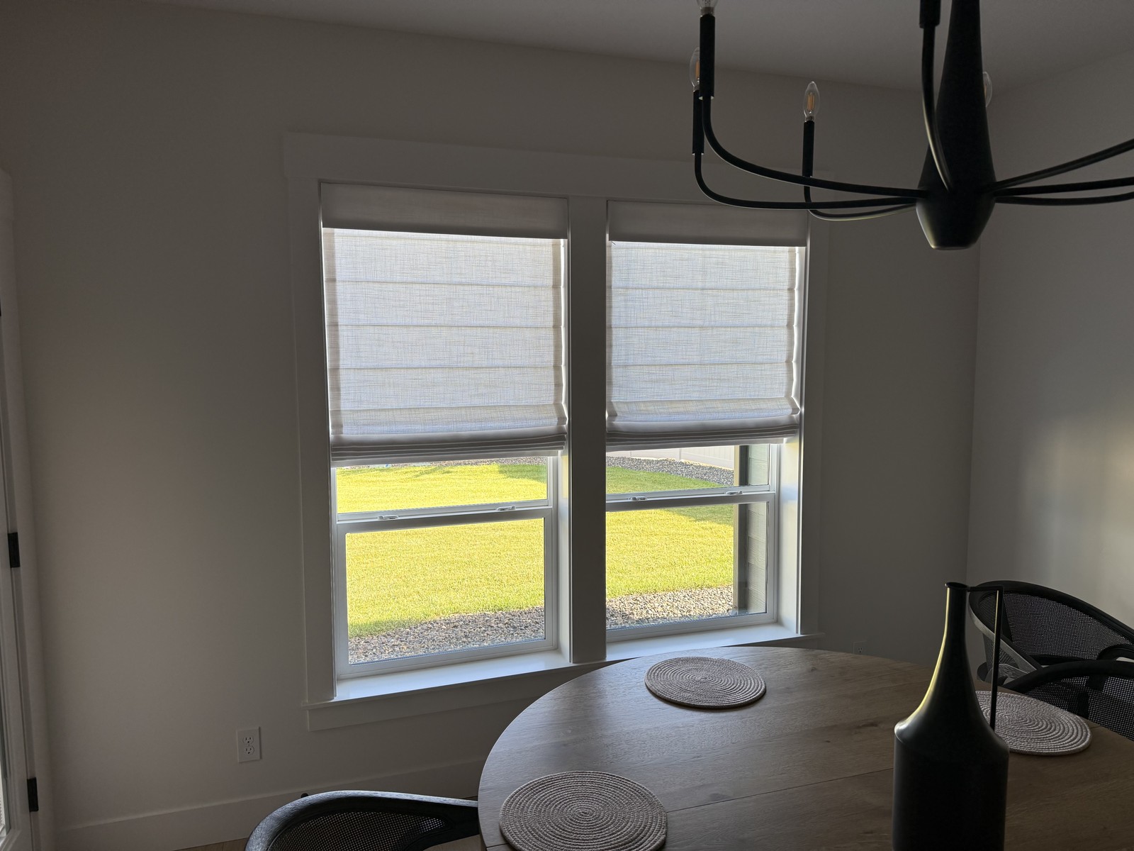 Roman shades in a dining nook