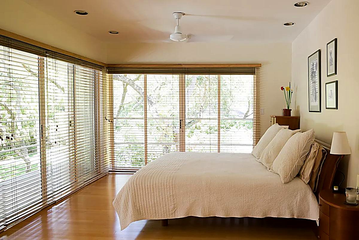 Premium window coverings in a sunlit bedroom